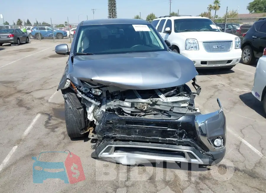 JA4AD3A32KZ046599 Photo# 12