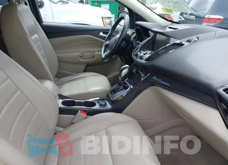 1FMCU0JX4EUB76896 Photo# 5