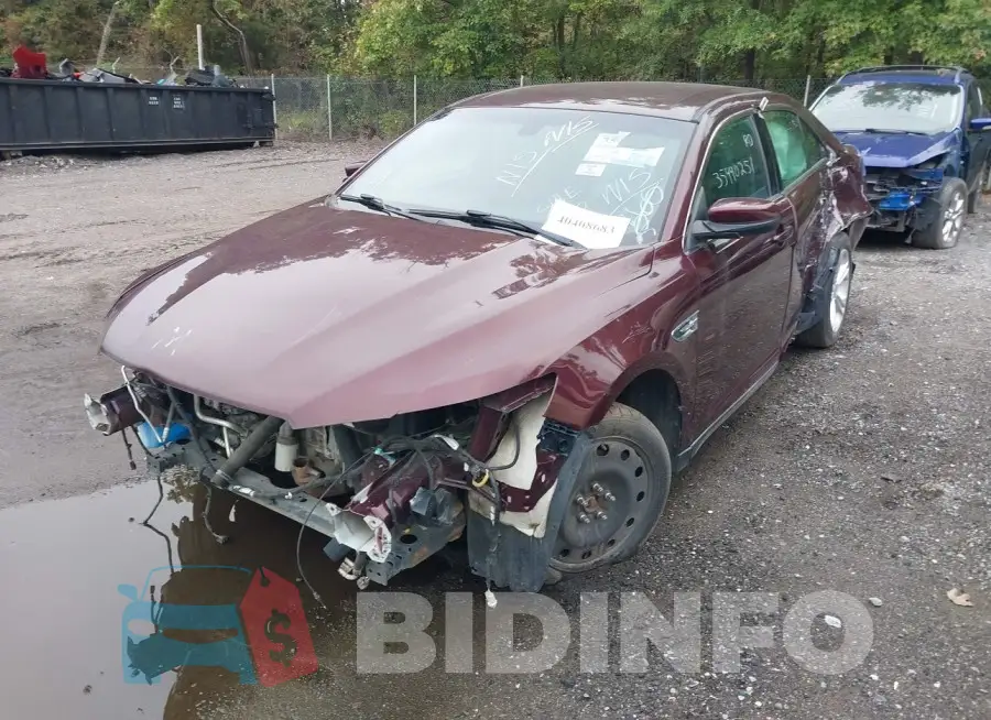 1FAHP2E82JG130952 Photo# 2
