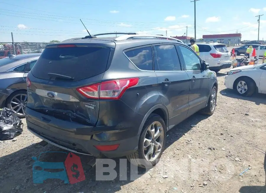 1FMCU0JX4GUA04032 Photo# 4
