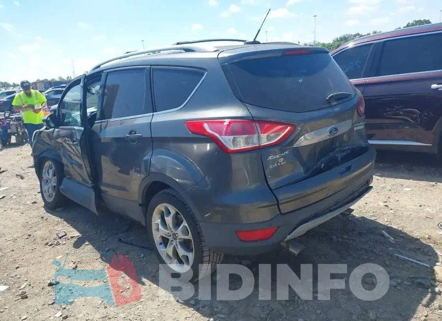 1FMCU0JX4GUA04032 Photo# 3
