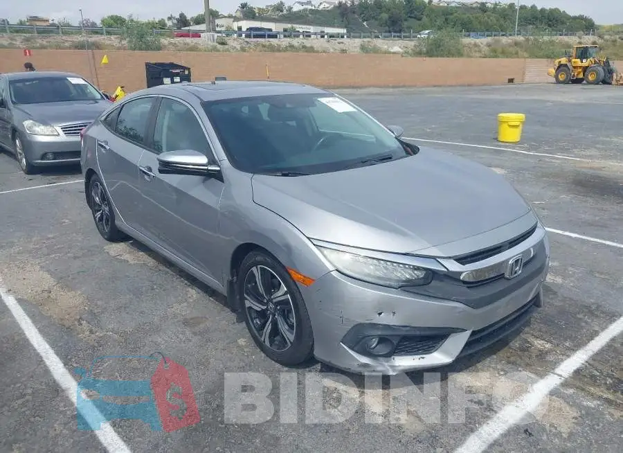 2HGFC1F9XGH635134 Photo# 1
