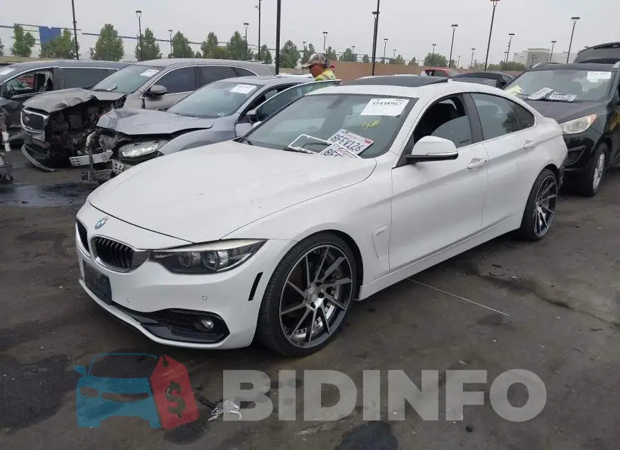 WBA4J1C55KBM14942 Photo# 2