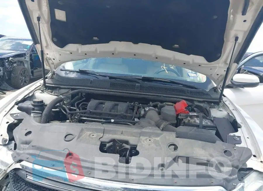 1FAHP2E88JG103111 Photo# 10