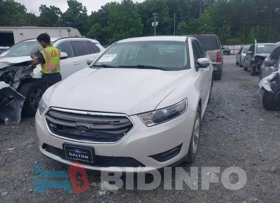 1FAHP2E88JG105084 Photo# 2
