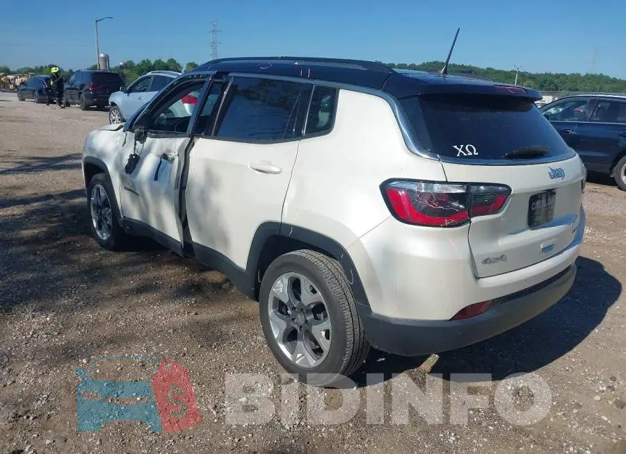 3C4NJDCB7LT106959 Photo# 3