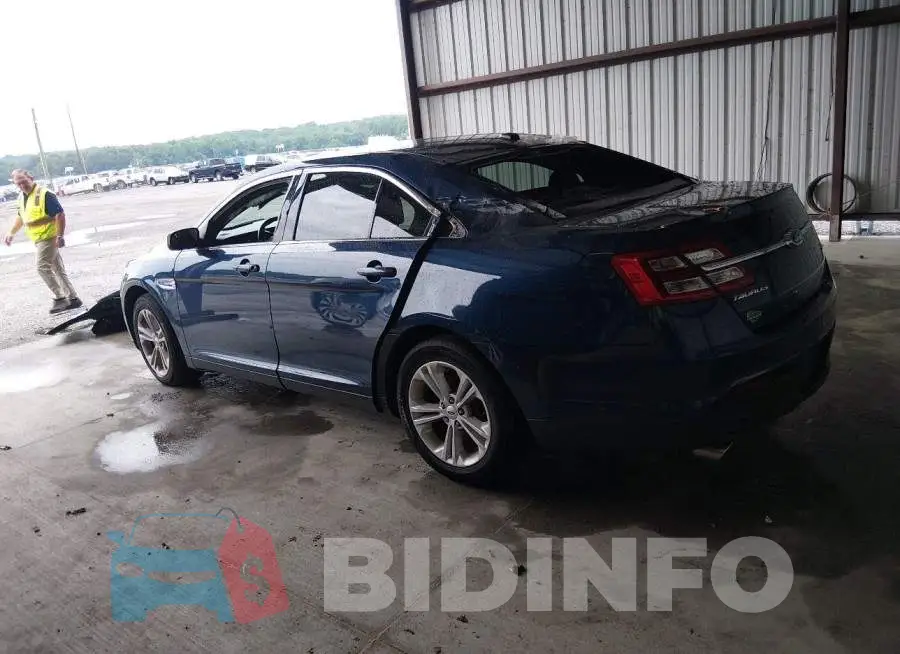 1FAHP2E85GG100935 Photo# 3