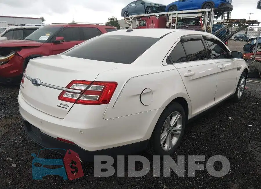1FAHP2E84JG110928 Photo# 4