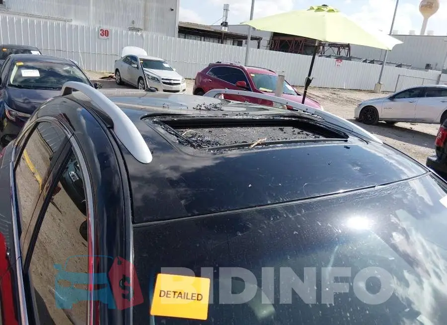 JN8CS1MU4GM671088 Photo# 6