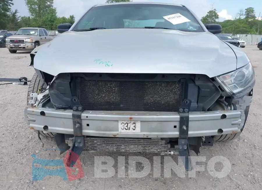1FAHP2MK8GG122585 Photo# 6