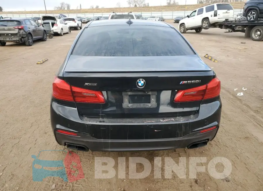 WBAJB9C57JG463849 Photo# 6