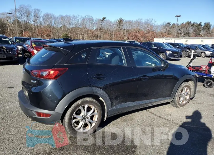 JM1DKFB78J0311881 Photo# 3