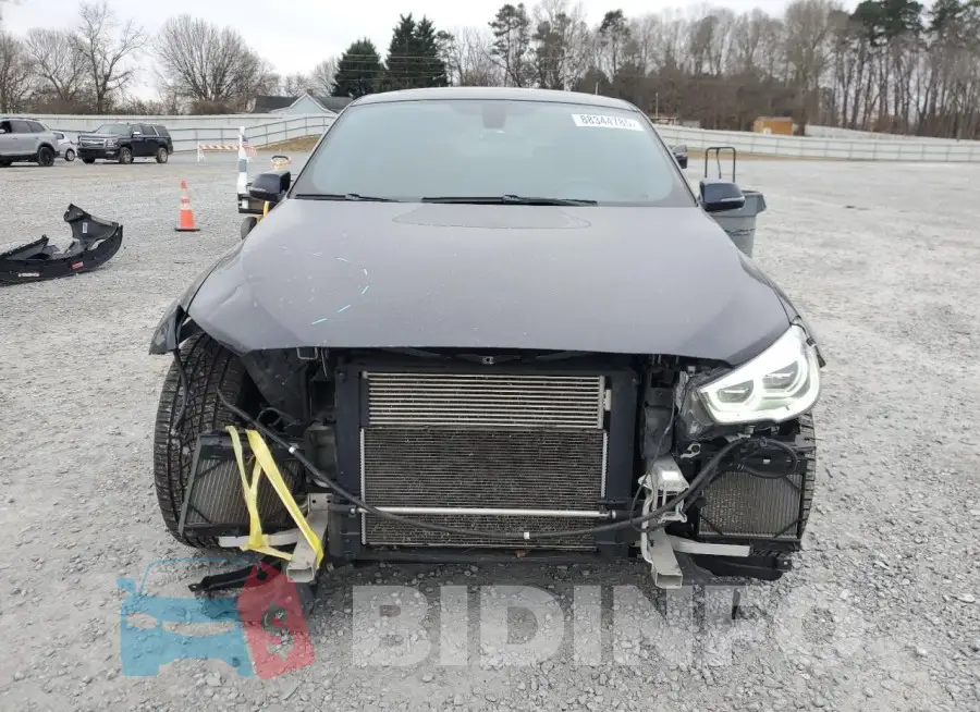 WBA5M0C58GD085154 Photo# 5