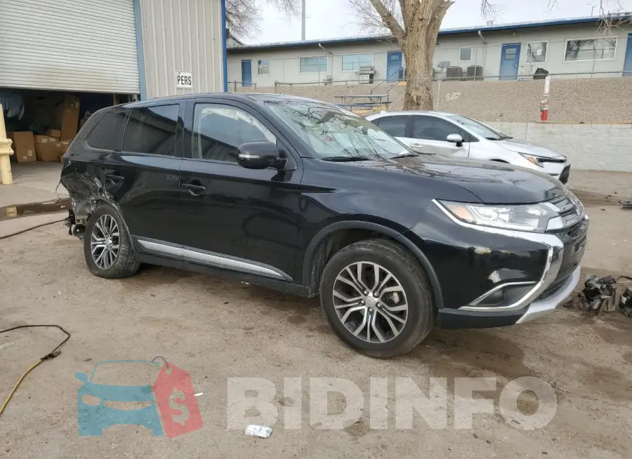 JA4AD3A32JZ042518 Photo# 4