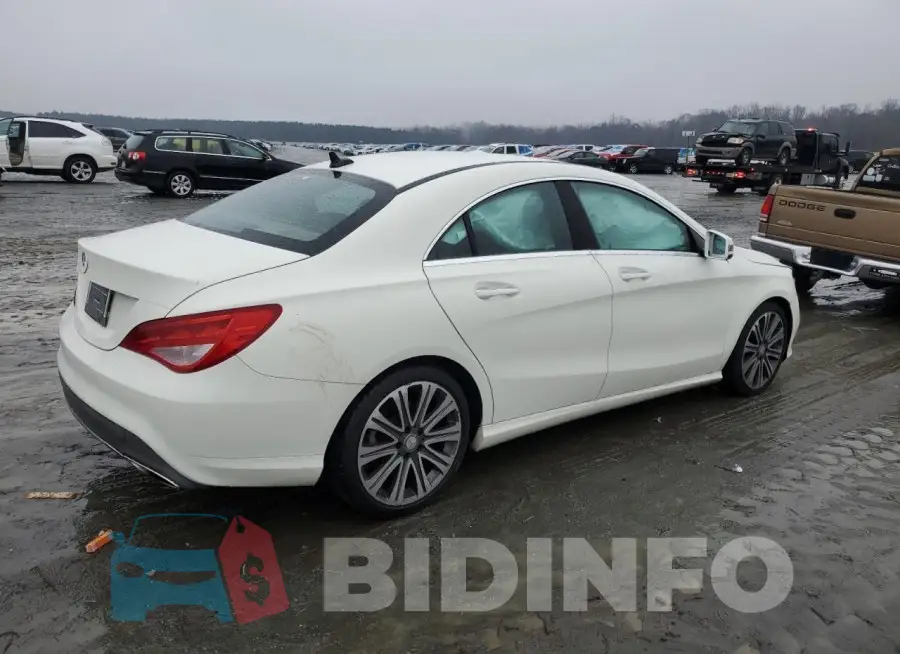 WDDSJ4EB6JN503257 Photo# 3