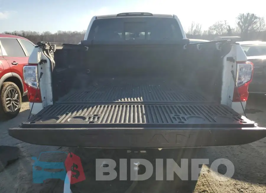1N6AA1E67JN519584 Photo# 6