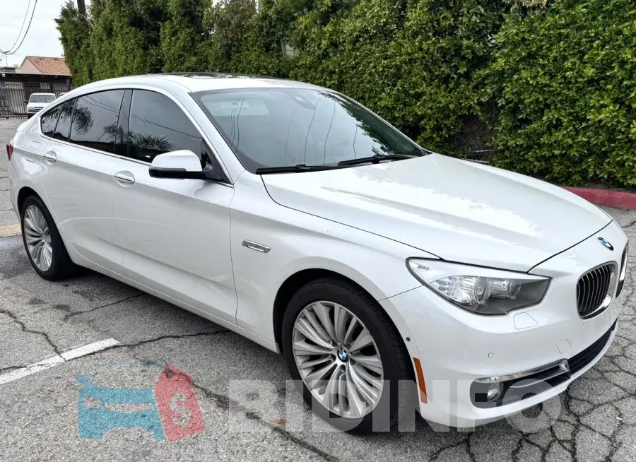 WBA5M2C5XGG499062 Photo# 1
