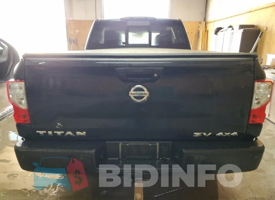 1N6AA1C52JN506848 Photo# 6