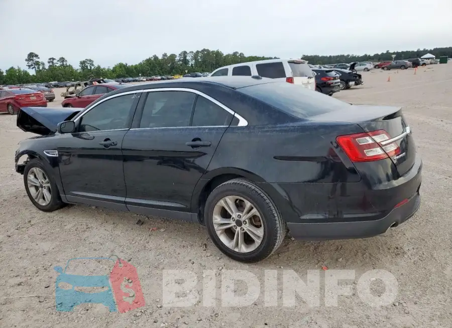 1FAHP2E87JG136553 Photo# 2