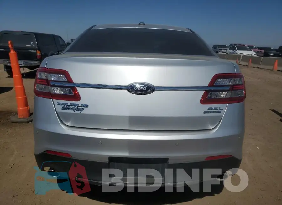 1FAHP2E87JG115802 Photo# 6