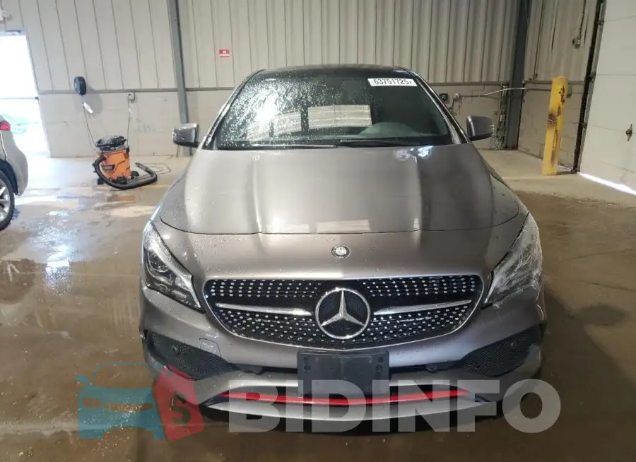 WDDSJ4EB2JN517818 Photo# 5
