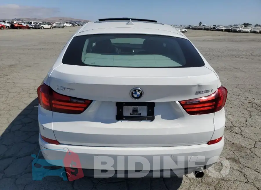 WBA5M2C53GG499145 Photo# 6