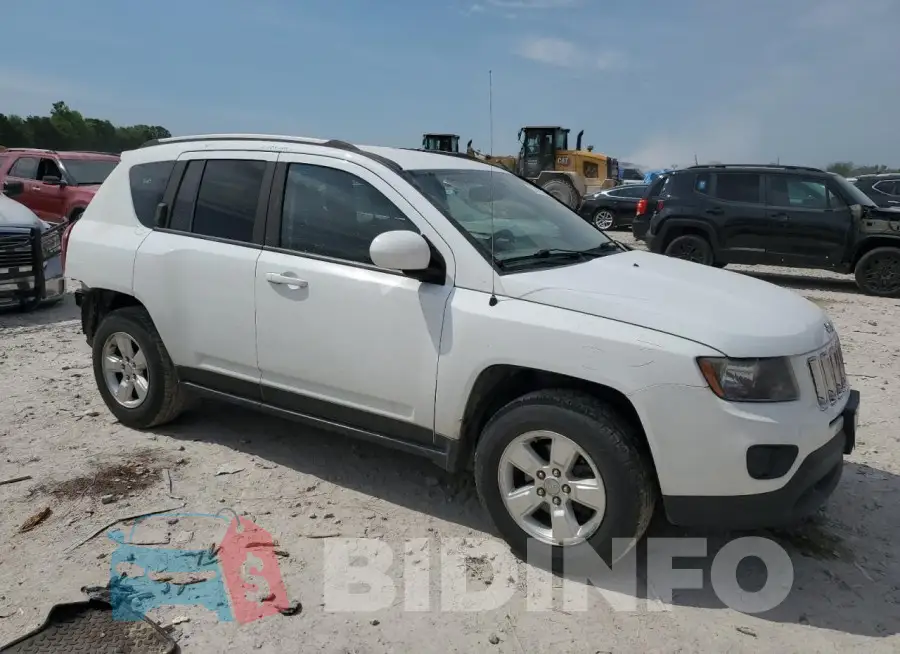 1C4NJCEA4GD698184 Photo# 4