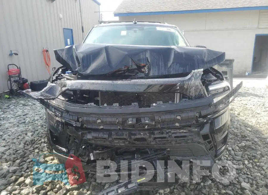 1FMJK1J87PEA51173 Photo# 5