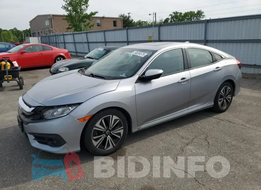19XFC1F34HE213710 Photo# 1
