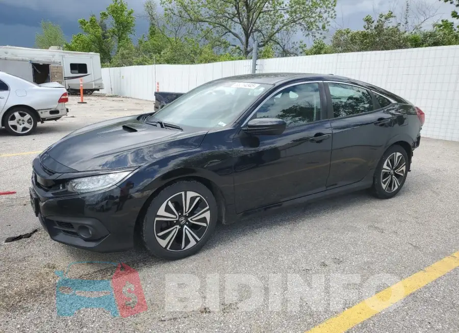 2HGFC1F74HH656853 Photo# 1