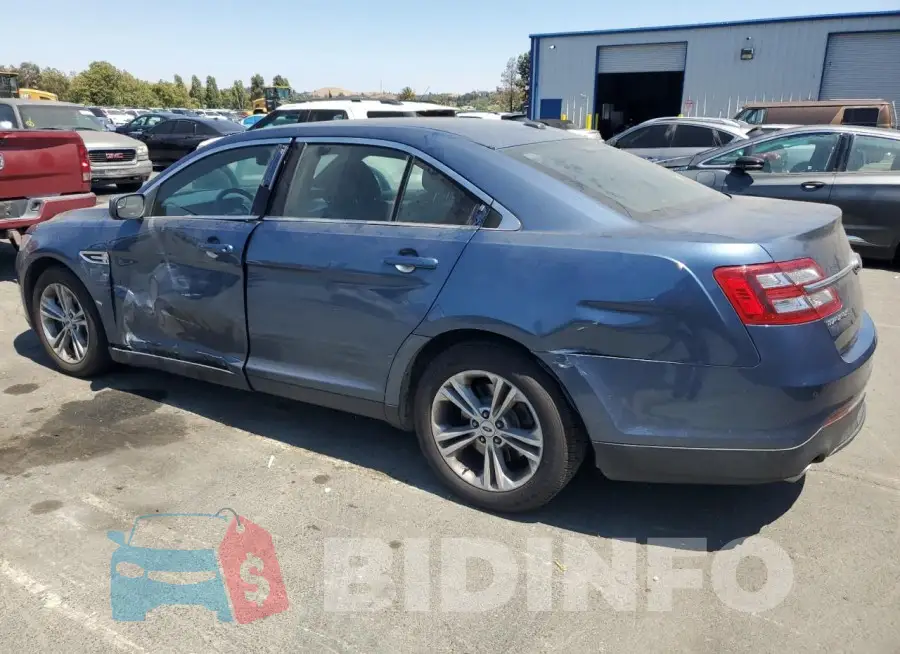 1FAHP2E86JG128217 Photo# 2