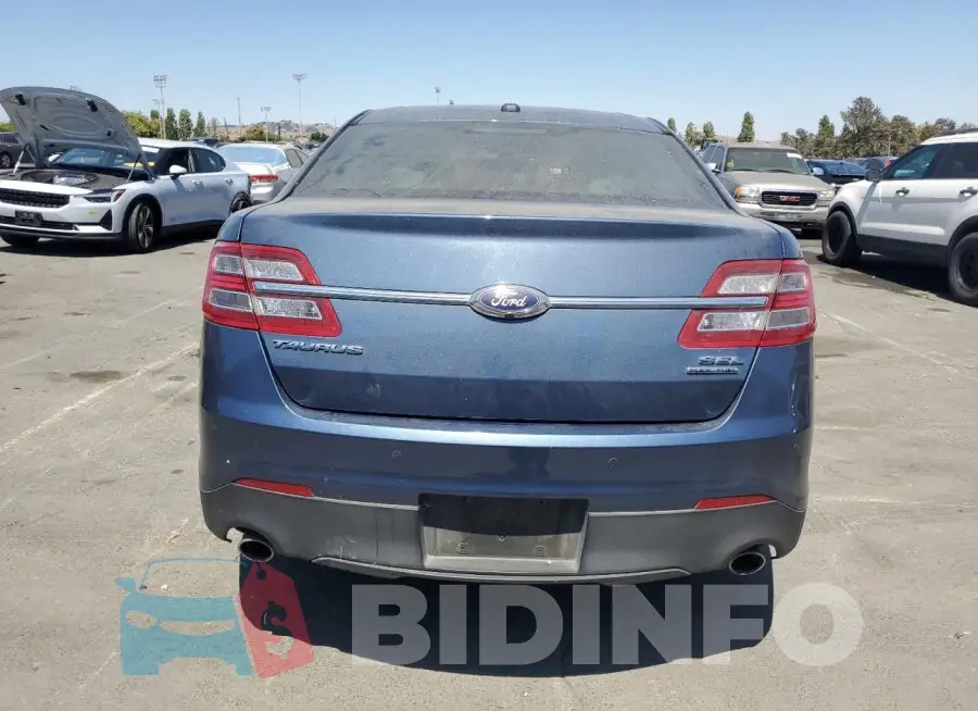 1FAHP2E86JG128217 Photo# 6
