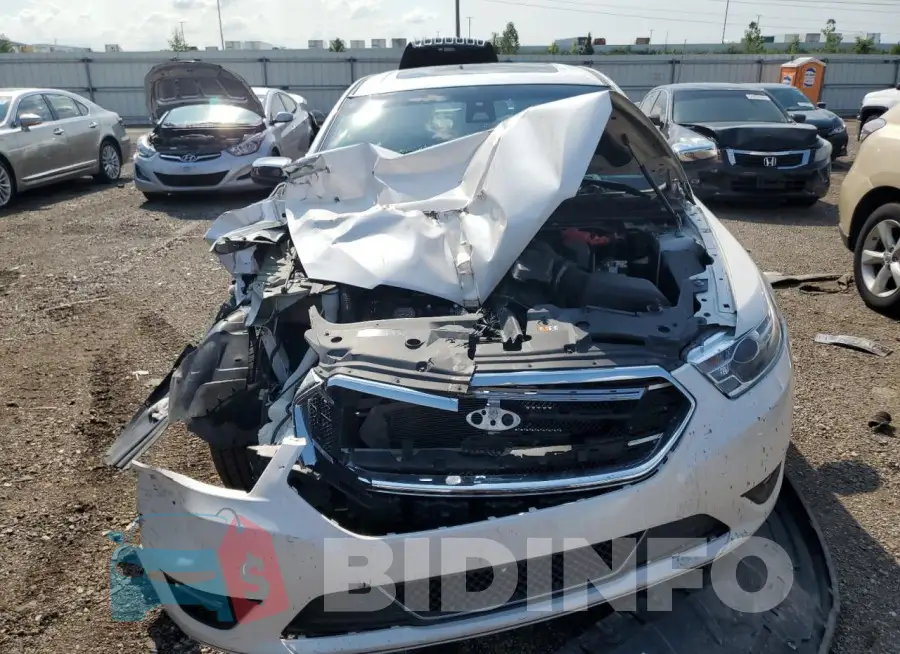1FAHP2J89JG128704 Photo# 5