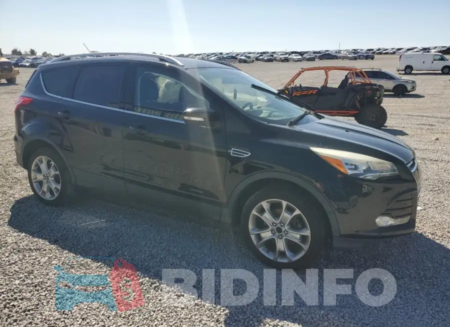 1FMCU0JX2GUA83538 Photo# 4