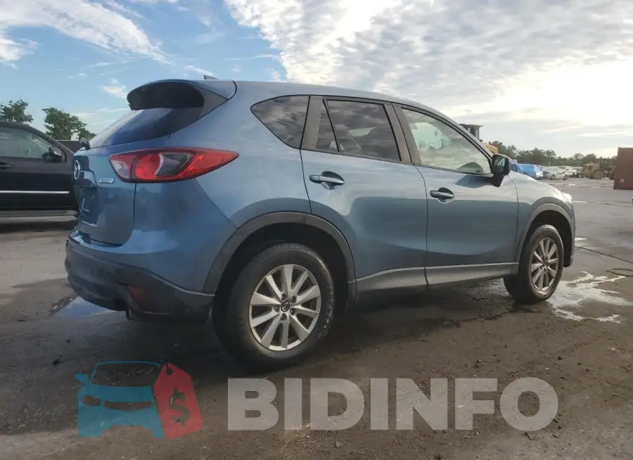 JM3KE2CY7G0841273 Photo# 3
