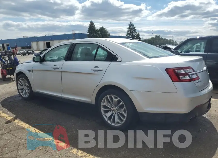 1FAHP2J83GG106934 Photo# 2
