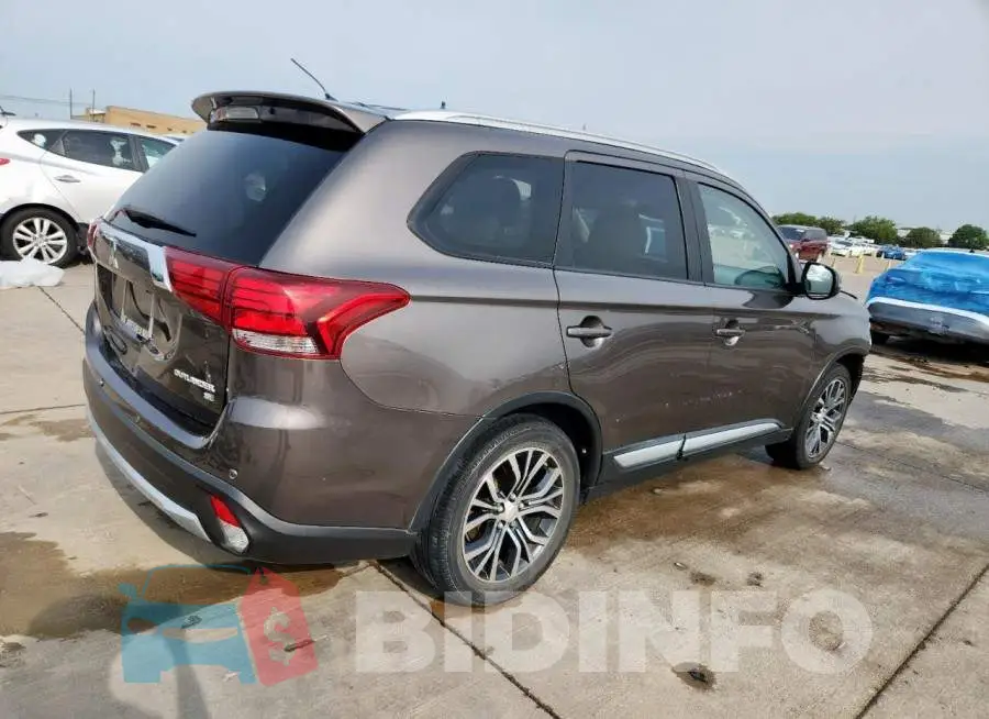 JA4AD3A39GZ012957 Photo# 3