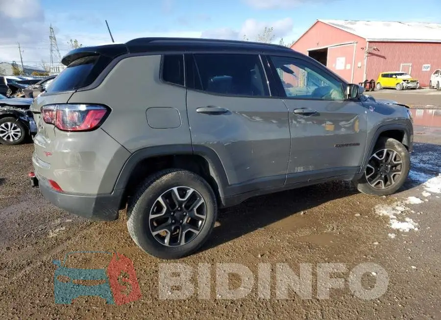 3C4NJDDB9LT125768 Photo# 3