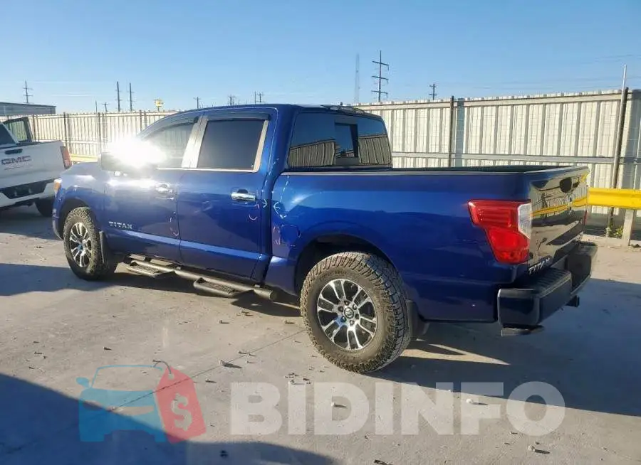 1N6AA1EC4MN528883 Photo# 2