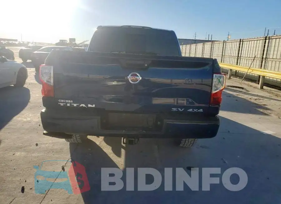 1N6AA1EC4MN528883 Photo# 6