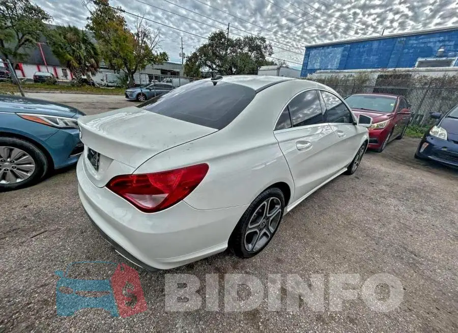 WDDSJ4EB6JN533472 Photo# 4