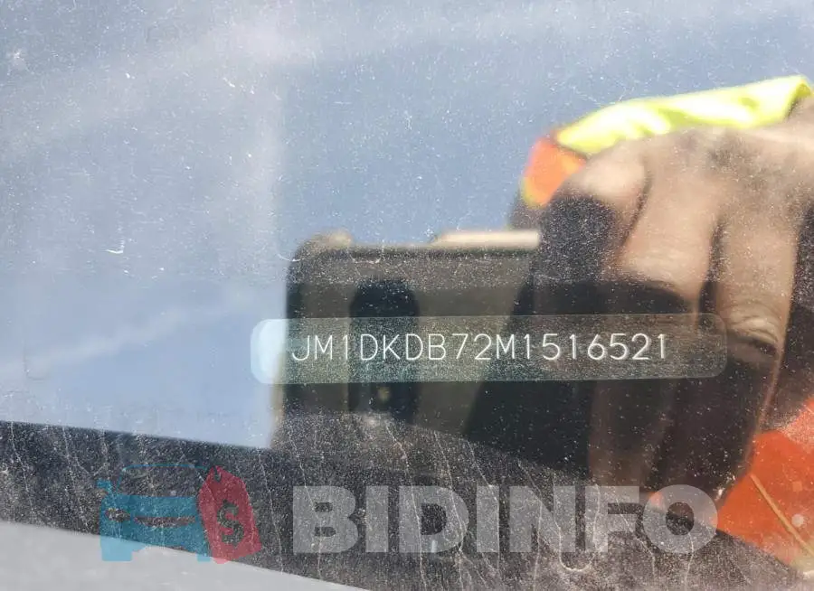 JM1DKDB72M1516521 Photo# 12