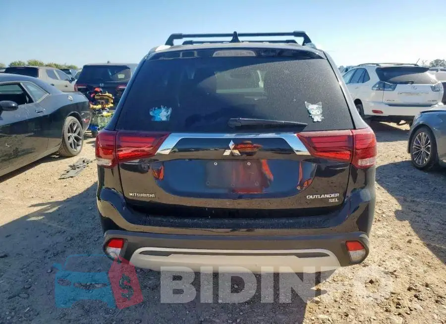 JA4AD3A32KZ018494 Photo# 6