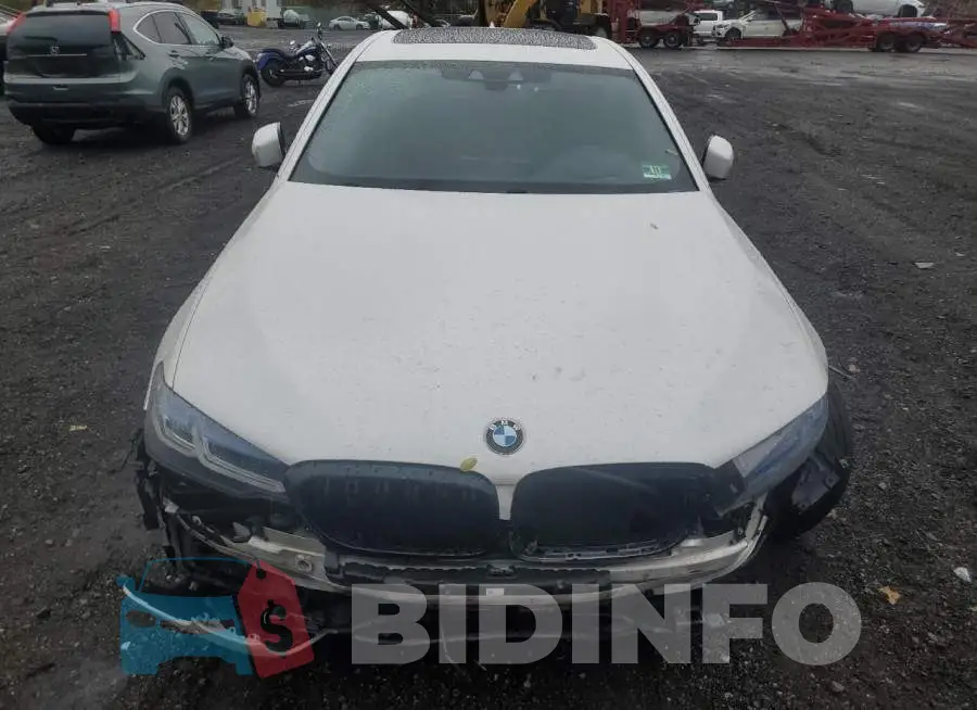 WBAJE7C50JG891483 Photo# 5