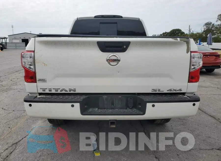 1N6AA1E57JN540877 Photo# 6