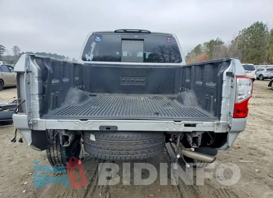 1N6AA1E60JN524352 Photo# 6