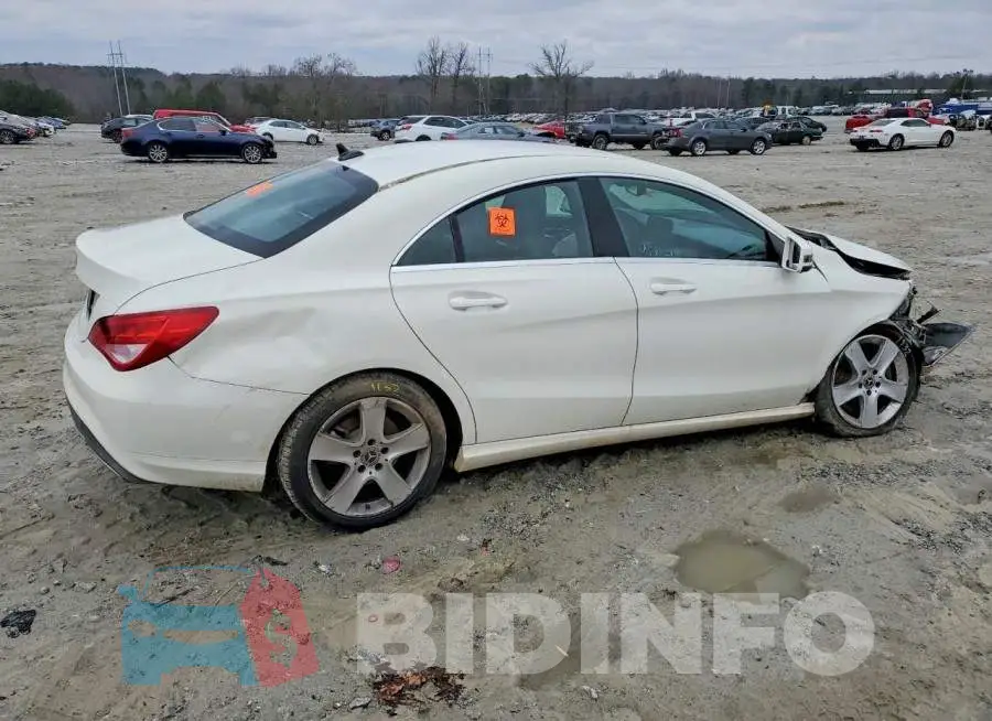WDDSJ4EB0JN609963 Photo# 3