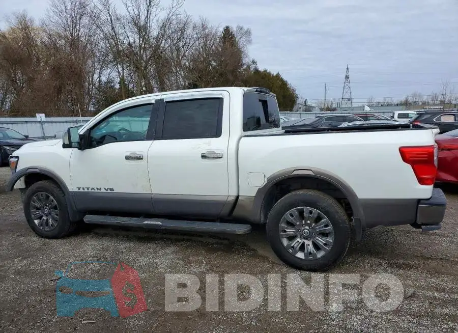 1N6AA1E54JN541663 Photo# 2