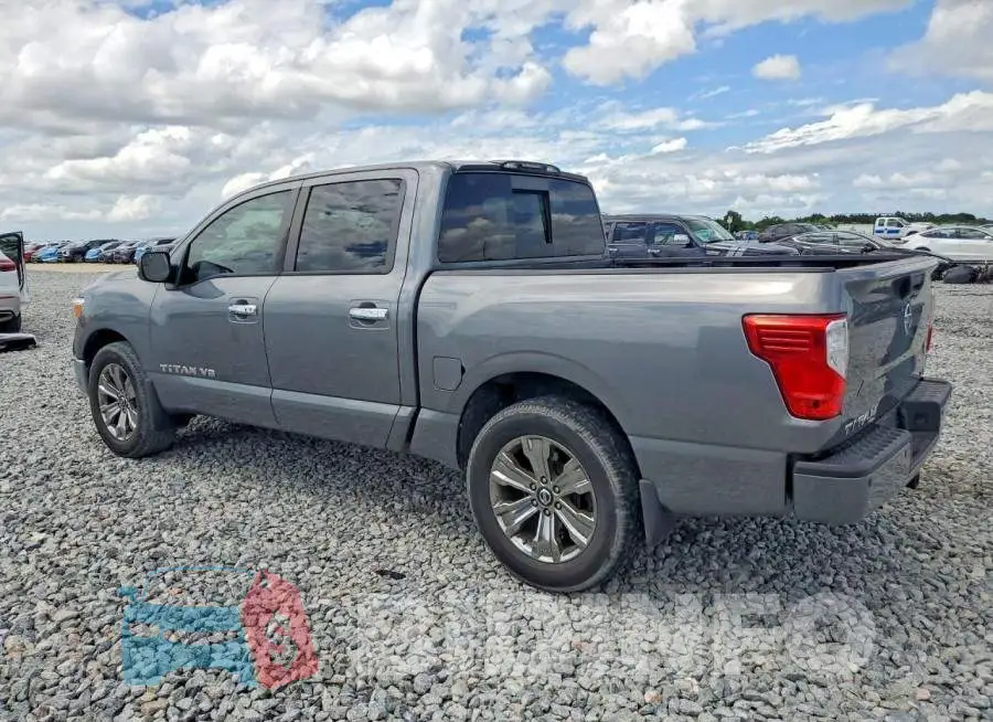 1N6AA1E60JN510693 Photo# 2