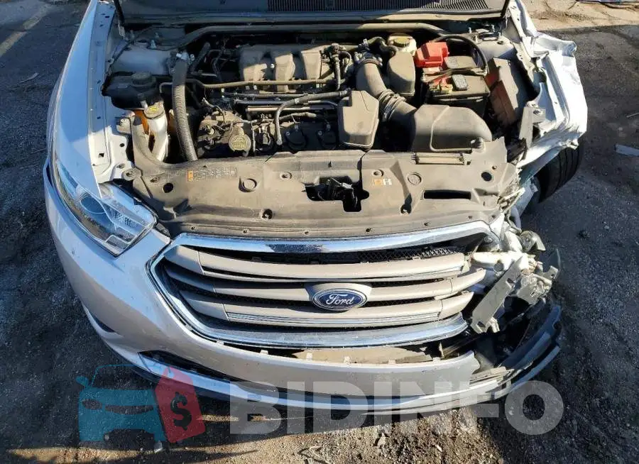 1FAHP2E82JG131034 Photo# 11
